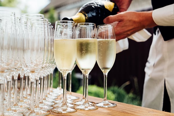Champagne-pour-into glasses in france