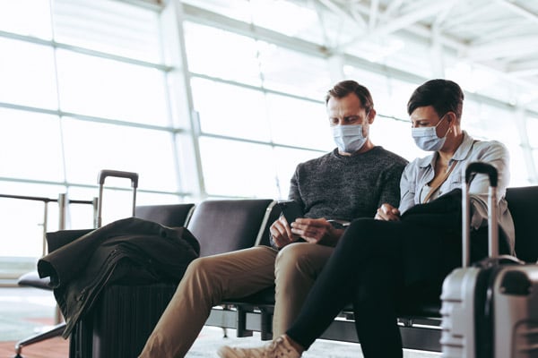 Couple-Airport-Wearing Masks