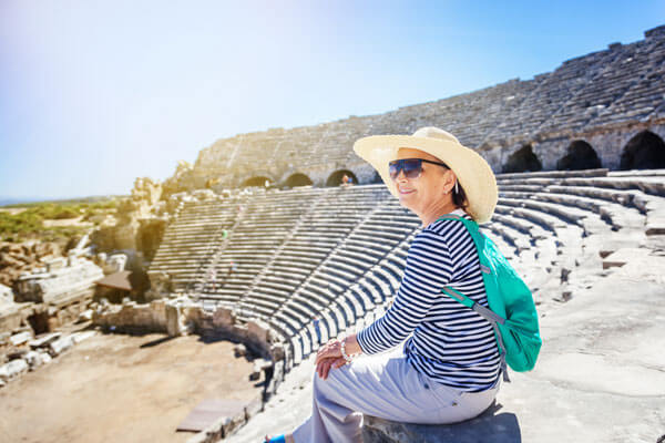 woman-in-ampitheater-ymt-vacations-ss_776772880
